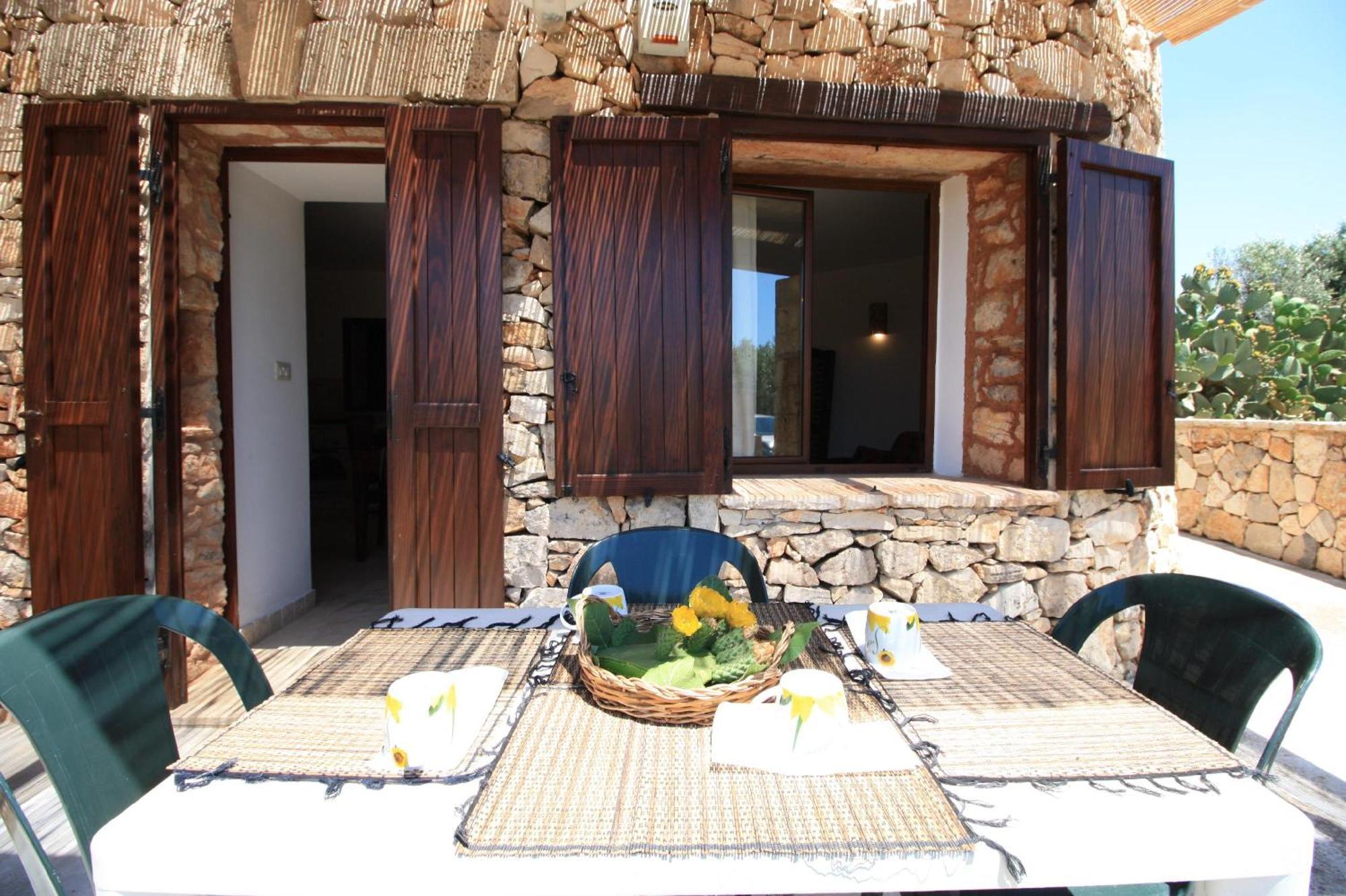 דירות מרינה די מנקוורסה Trullo Macchie מראה חיצוני תמונה